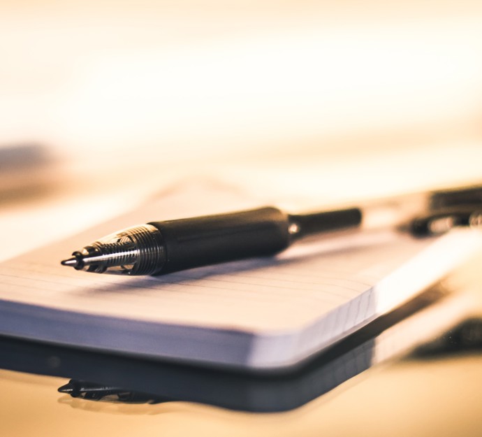 Notatspapir med en kuglepen